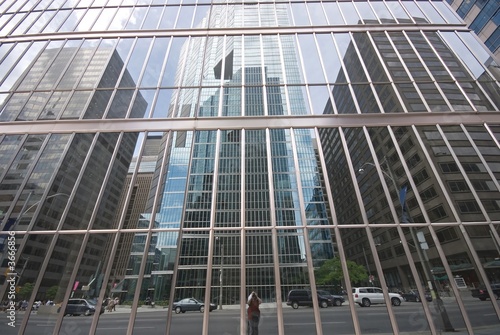 One side of the street reflected in the other