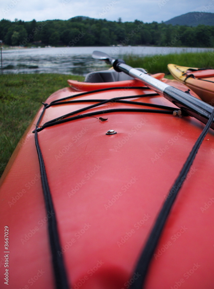 Naklejka premium Perspective of Lake in Upstate New York From Red Kayak