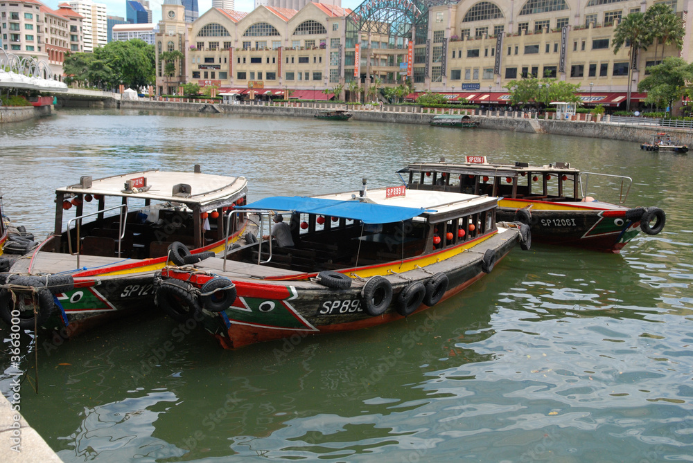Tourist boat and river in the city 