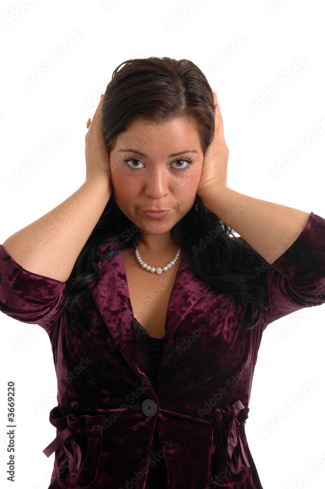 A pretty young woman covering her ears in hear no evil A pretty young woman covering her ears in hear no evil