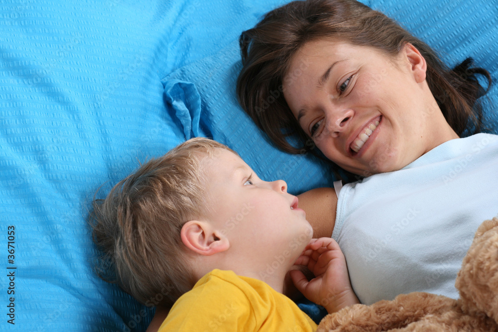 mother and three years old boy in bedroom mother and three years old boy in bedroom