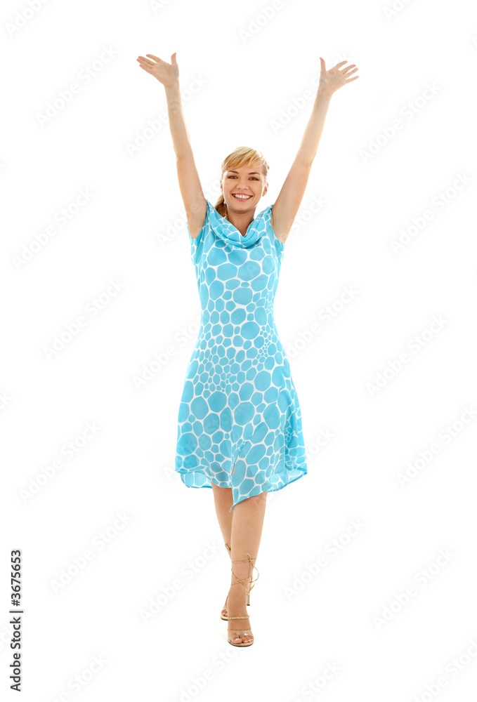picture of happy girl in blue dress with hands up picture of happy girl in blue dress with hands up