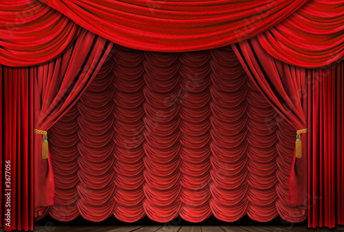 Old fashioned, elegant theater stage with velvet curtains.
