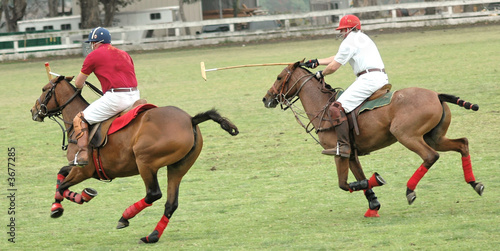 Two Polo Players Racing © Clarence Alford
