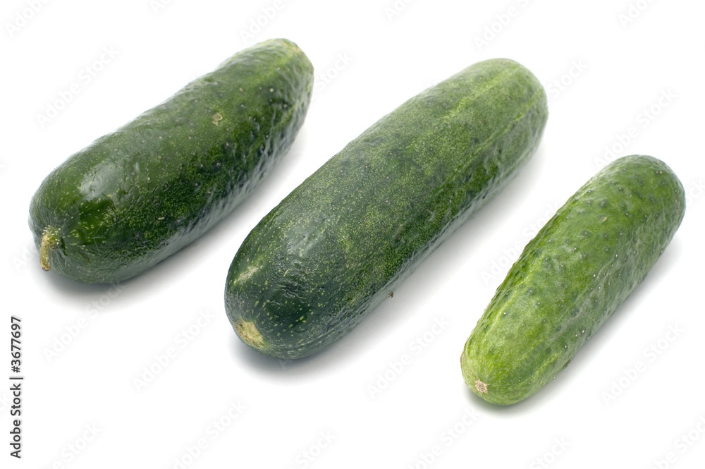 series object on white food - Three cucumbers series object on white food - Three cucumbers