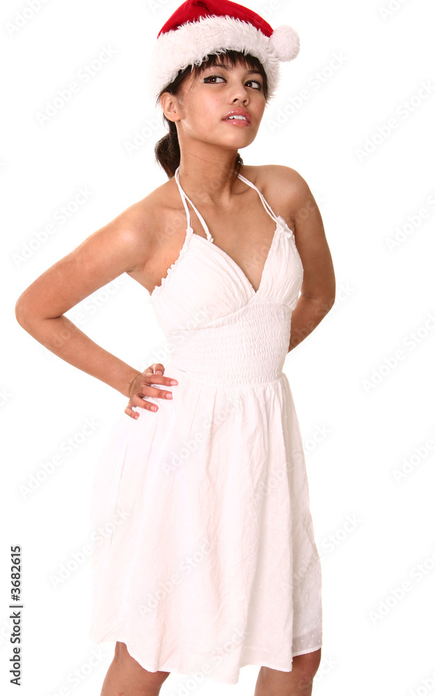 Beautiful Brunette Wearing Tank Top And Christmas Hat Beautiful Brunette Wearing Tank Top And Christmas Hat
