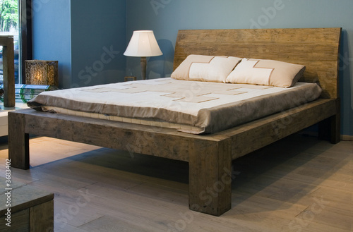 Bedroom with old-style wooden bed