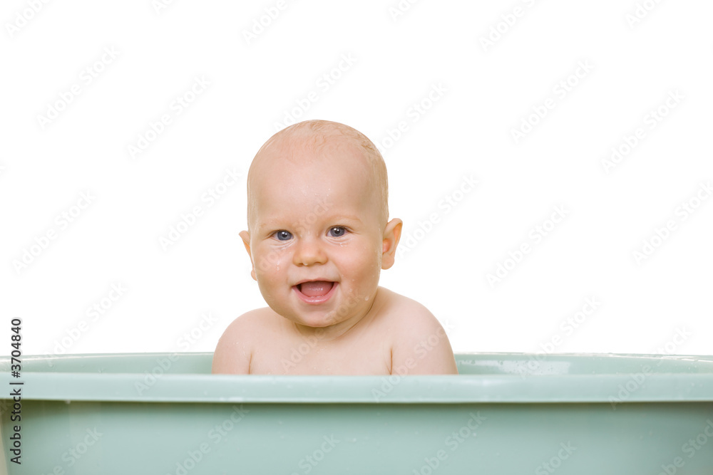 An 8 month boy bathing, isolated on white An 8 month boy bathing, isolated on white