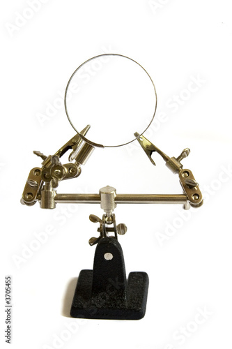 Magnifying glass stand on white background
