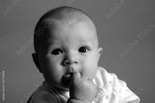 A charming portrait of a little baby boy