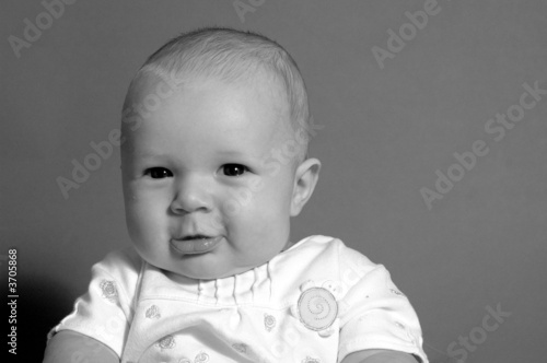 A charming portrait of a little baby boy.