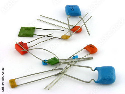 Capacitors. A close up. It is isolated on a white background.
