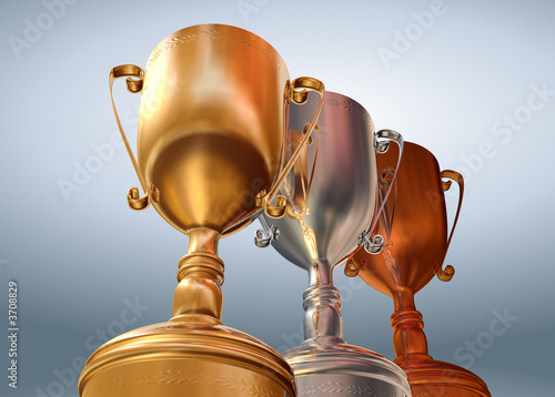 Rendered three cups (gold, silver, bronze) on blue background