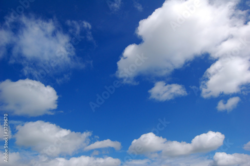 A summer sky with white clouds.