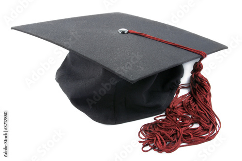 graduation cap with a red tassel isolated on white