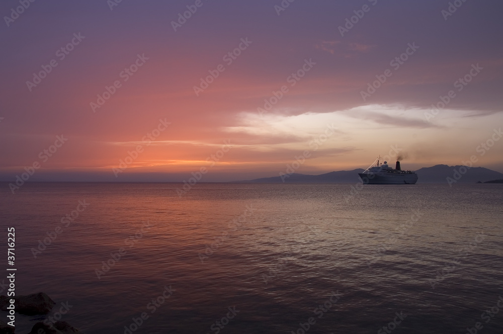 Sunset over Cruise boat at night, Aegean sea, Greece
