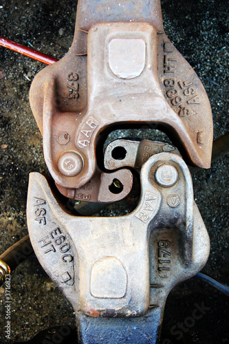 Train coupler that looks like grasped hands