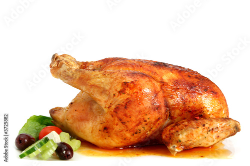 Golden roasted chicken, ready to serve.
