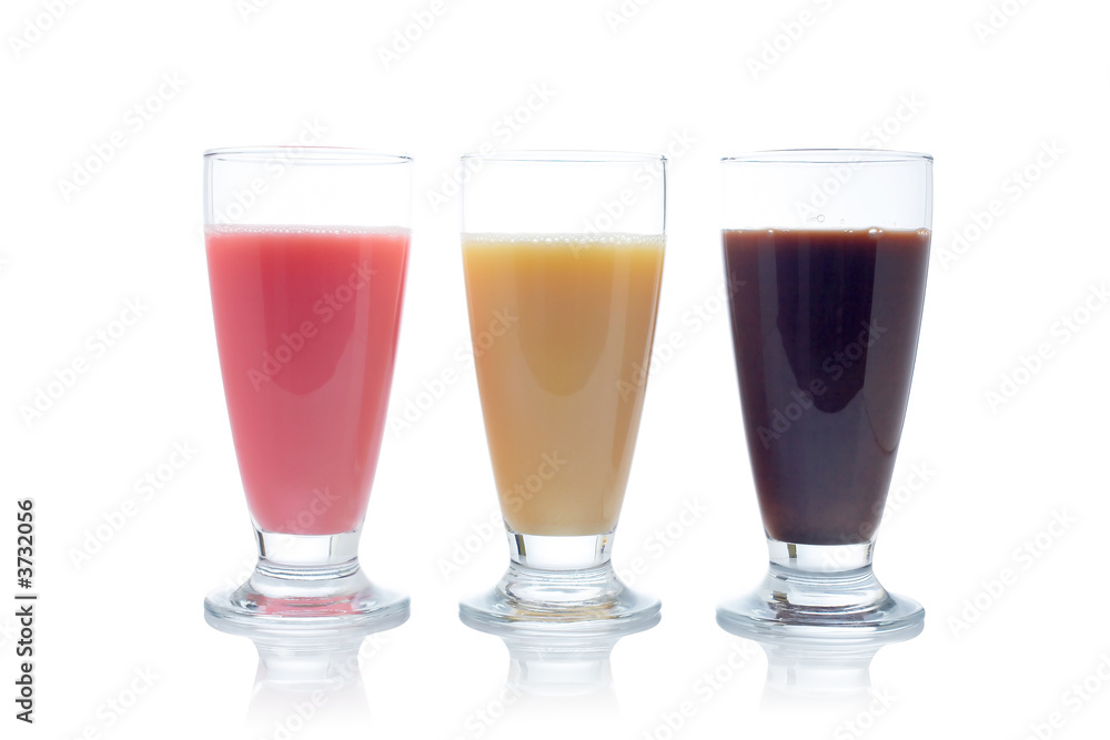 Three milkshakes reflected on white background Three milkshakes reflected on white background