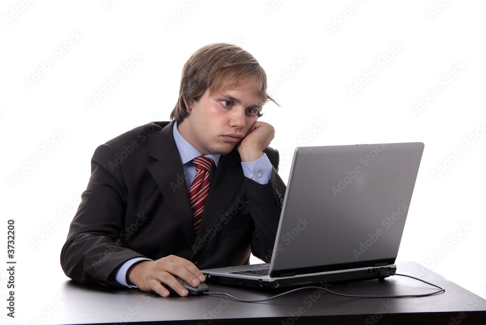 young man working with his personal computer young man working with his personal computer