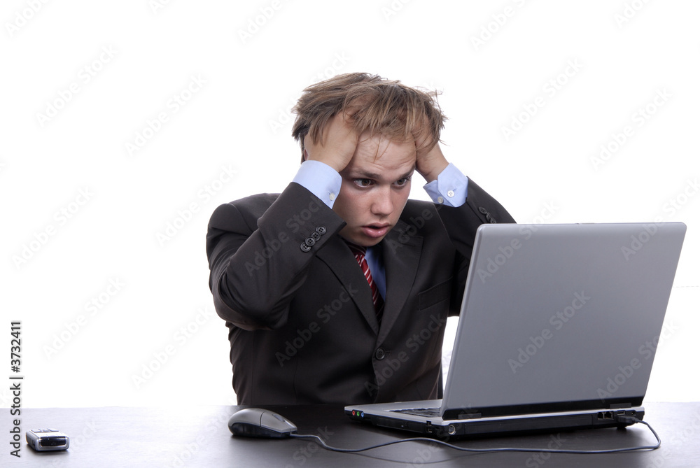 young man working with his personal computer young man working with his personal computer