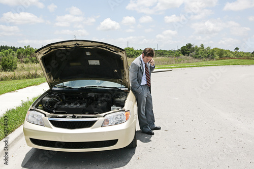 A businessman whose car has broken down 
