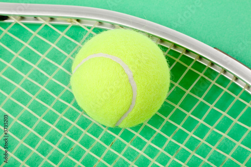 a tennis ball and racket