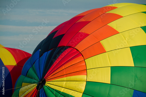 Colorful Hot Air Balloons being filled and inflated for flight