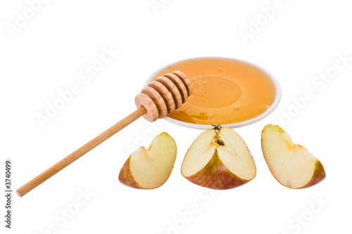 Apples and honey are symbols of the Jewish new year photo