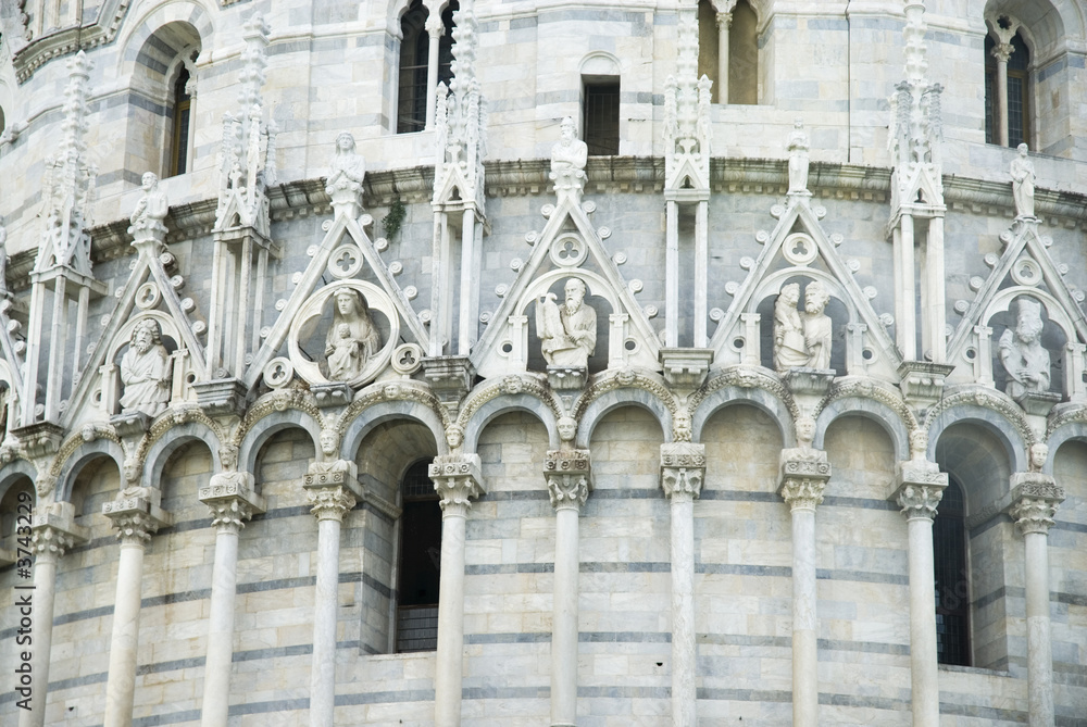 Fototapeta premium Pisa - details of the wall of the baptistery