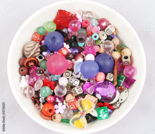 Obraz na płótnie Bowl of beads and buttons - craft supplies. w salonie