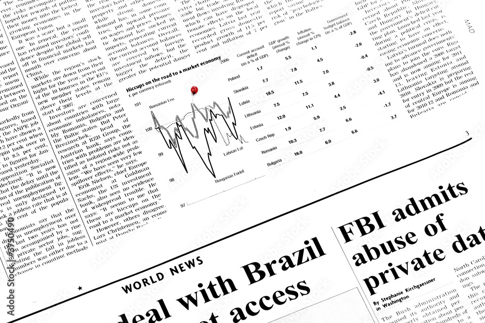 Financial section of a newspaper showing markets Financial section of a newspaper showing markets