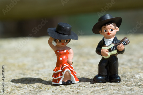Guitarist and a Spanish dancer doll