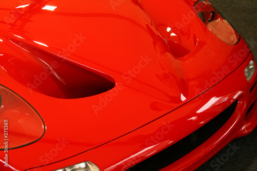 red supercar hood © Christopher Nolan
