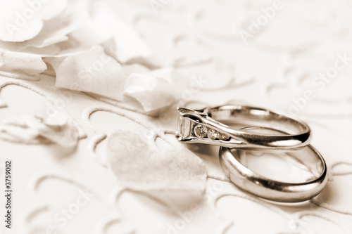 engagement ring and wedding ring, toned sepia