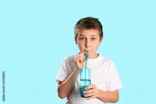 A child drinking pure fresh water.