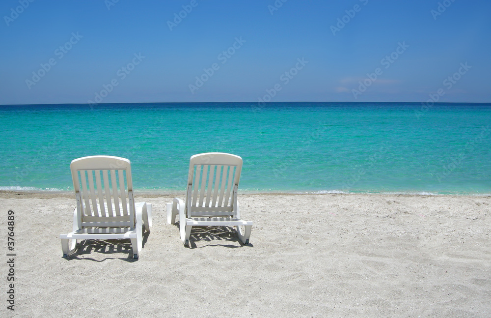 beach chairs on sand 