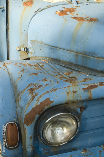 Blue old-fashioned rusty ancient car Praga V3S. photo