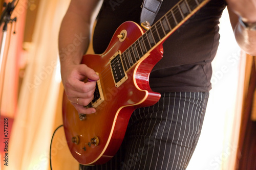 Musician play on guitar #2
