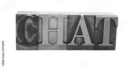 the word 'CHAT' in old, inkstained metal type photo