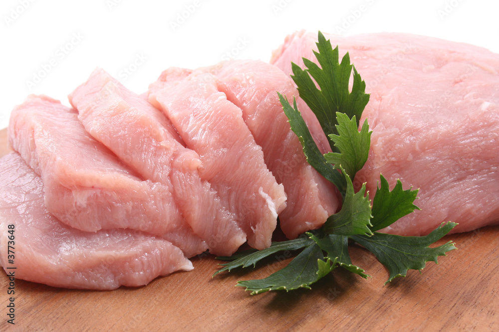 boneless pork loin on board - isolated on white boneless pork loin on board - isolated on white