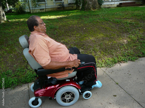 Man Riding Power Chair