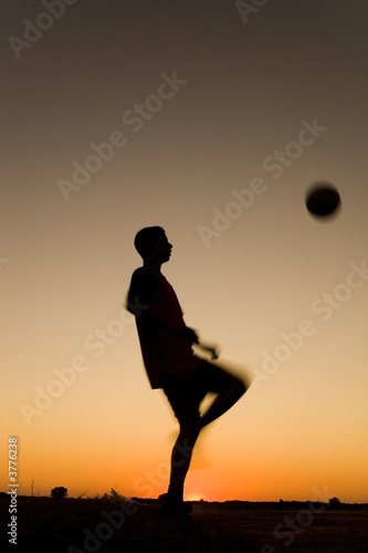 Fototapeta Naklejka Na Ścianę i Meble -  football at sunset