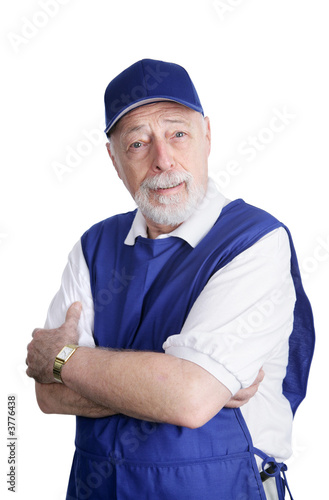 A senior man dressed for work in a discount store 