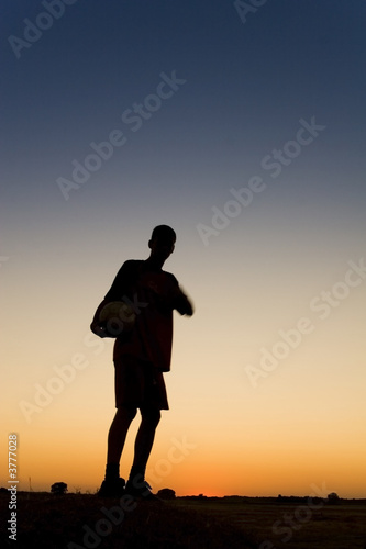 football at sunset © Kavita