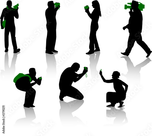 Silhouettes of photographer and cameraman