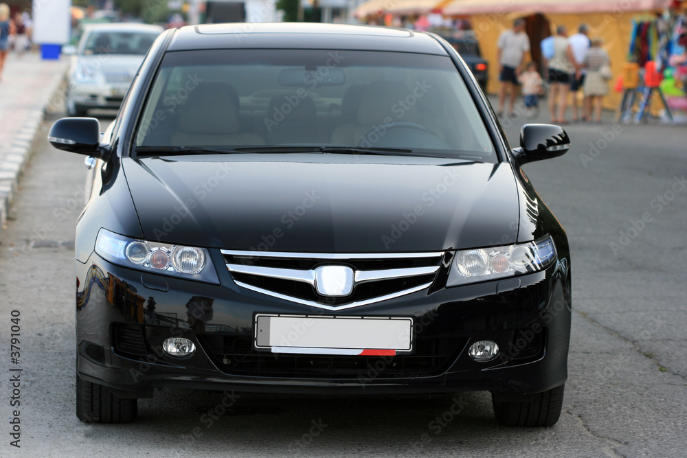 black luxury car on the street