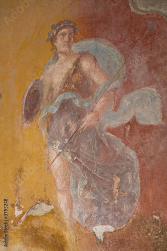 Fresco from Pompeii, Italy. The mural depicts a god