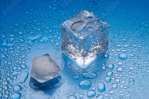 Melting ice on blue background (2)