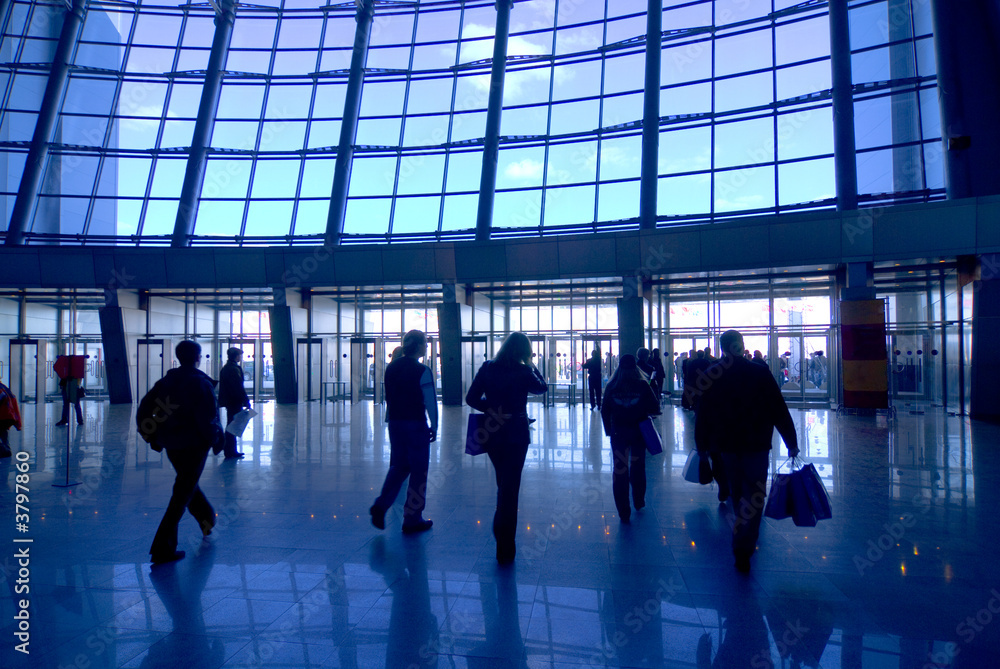People silhouettes at airport building People silhouettes at airport building